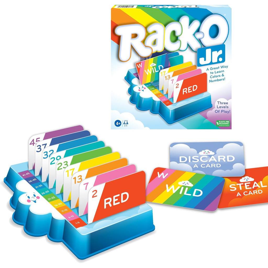 Rack-O Jr. Children's Edition brings fun to kids ages 4+ with vibrant numbered cards alongside three instructional ones: "Discard a Card," "Wild," and "Steal a Card." Box and game setup are clearly displayed for easy playtime.