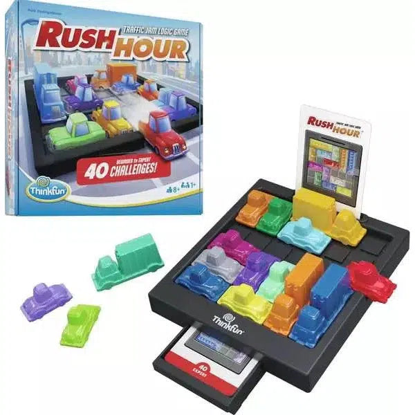 Explore the Rush Hour logic game, an educational experience featuring colored vehicle pieces on a grid. The packaging proudly claims "40 Challenges!" Discover and purchase this intriguing game at the ThinkFun Online Shop.