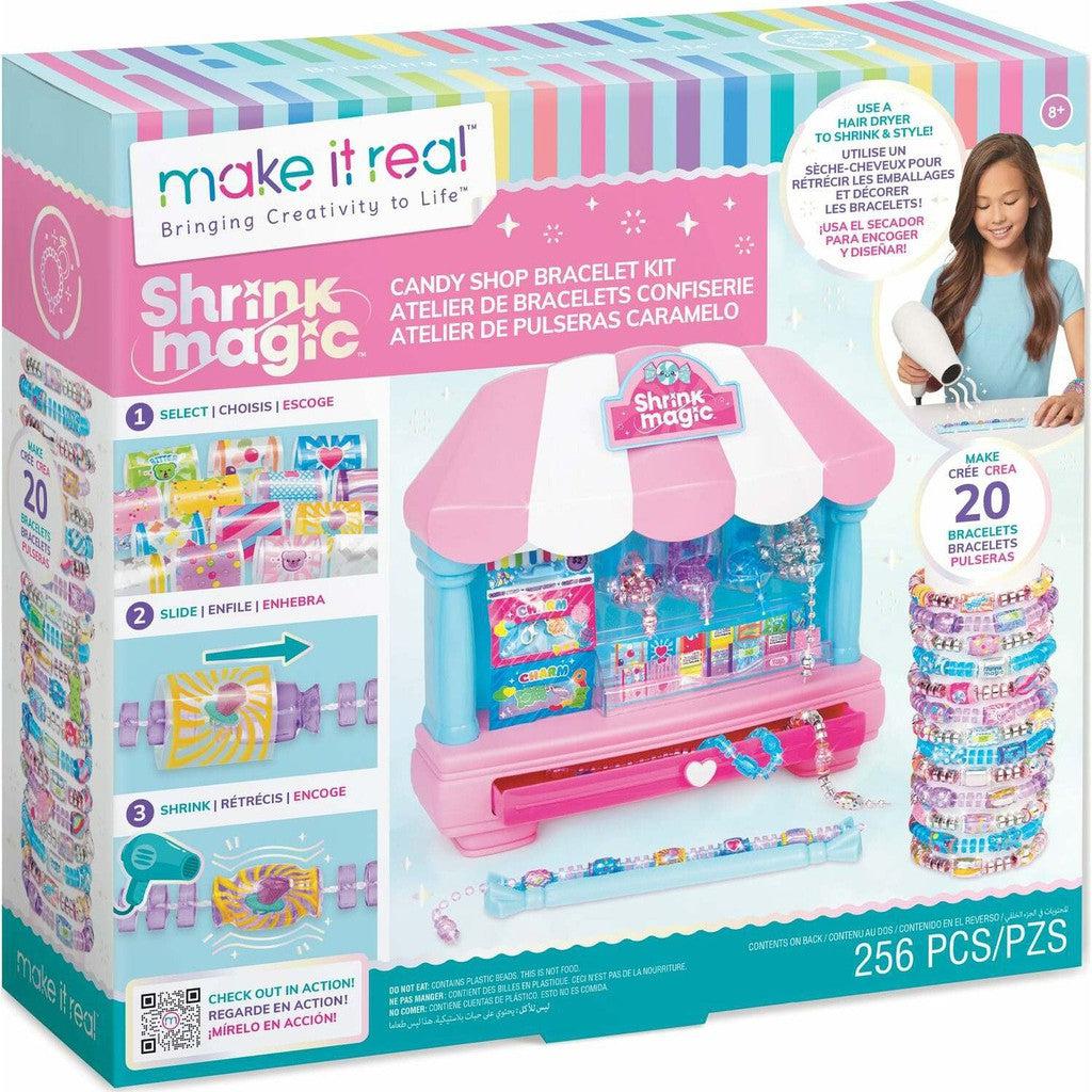 Discover the vibrant packaging of the Shrink Magic Candy Shop Bracelet Kit, featuring 256 pieces. This sweet accessory collection dazzles with a pink and white design, perfectly highlighting an array of colorful bracelets ready to craft.