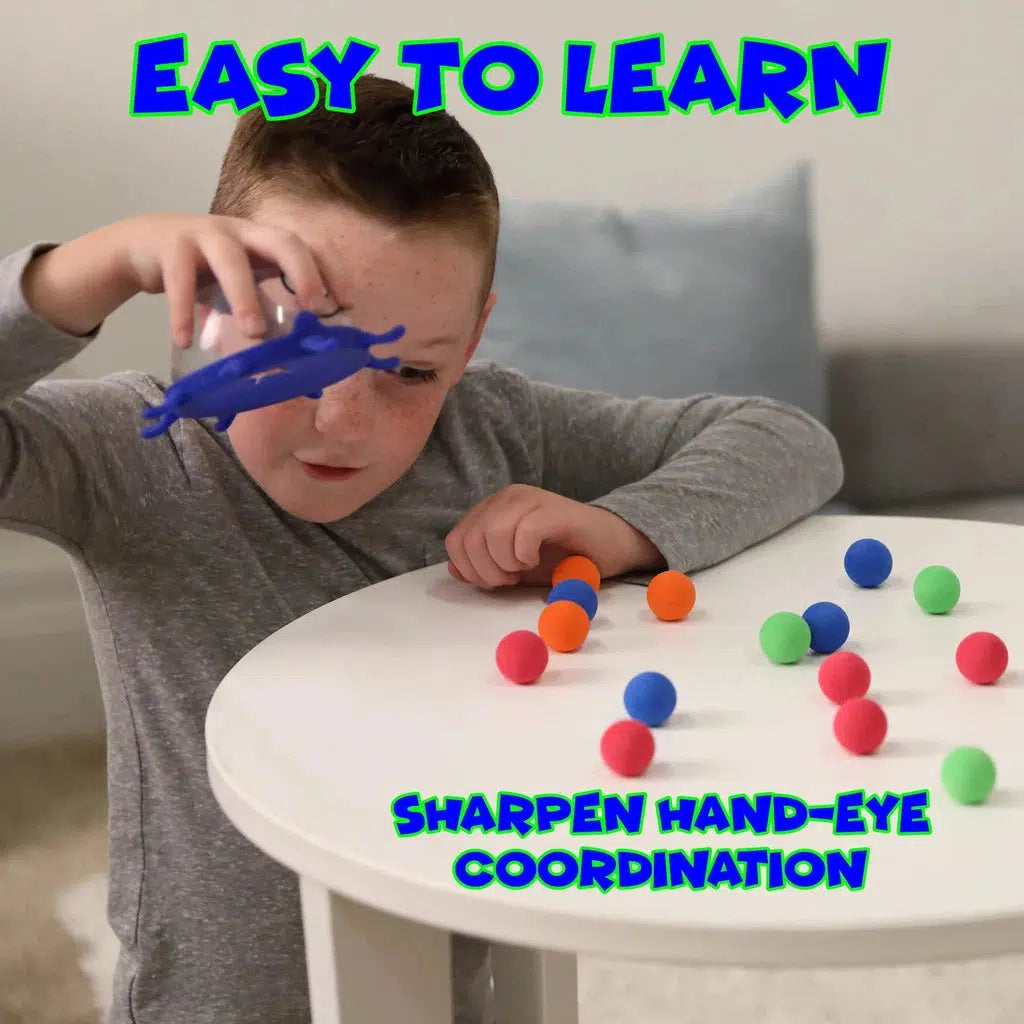 Child playing an educational game with colorful balls and a toy shark. Text reads: "Easy to Learn," "Sharpen Hand-Eye Coordination," and "Features Color-Matching Fun." Dive into the excitement of Squid Squish, where learning meets endless playtime enjoyment!