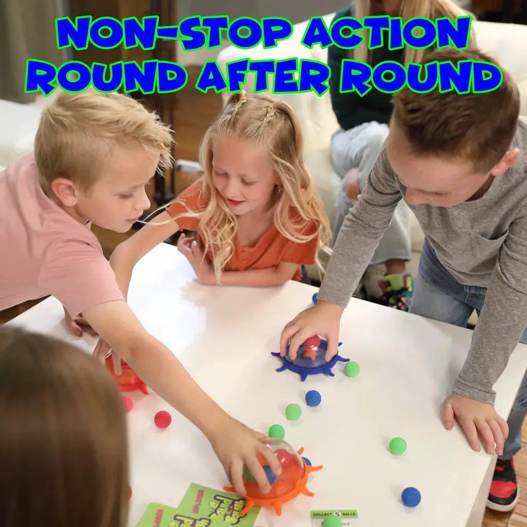 Children playing a color-matching tabletop game with colorful balls and cups, focused and engaged. It's an educational game with "non-stop action round after round" text above them.