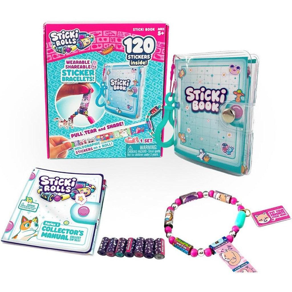 The STICKI Rolls set with 120 fun sticker designs includes a sticki book, bracelet, collector's manual, and sticker rolls. Packaging highlights "wearable, shareable sticker bracelets." Suitable for ages 6+.