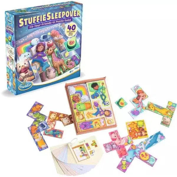 Box and components of "Stuffie Sleepover" puzzle game featuring colorful animal and character pieces.