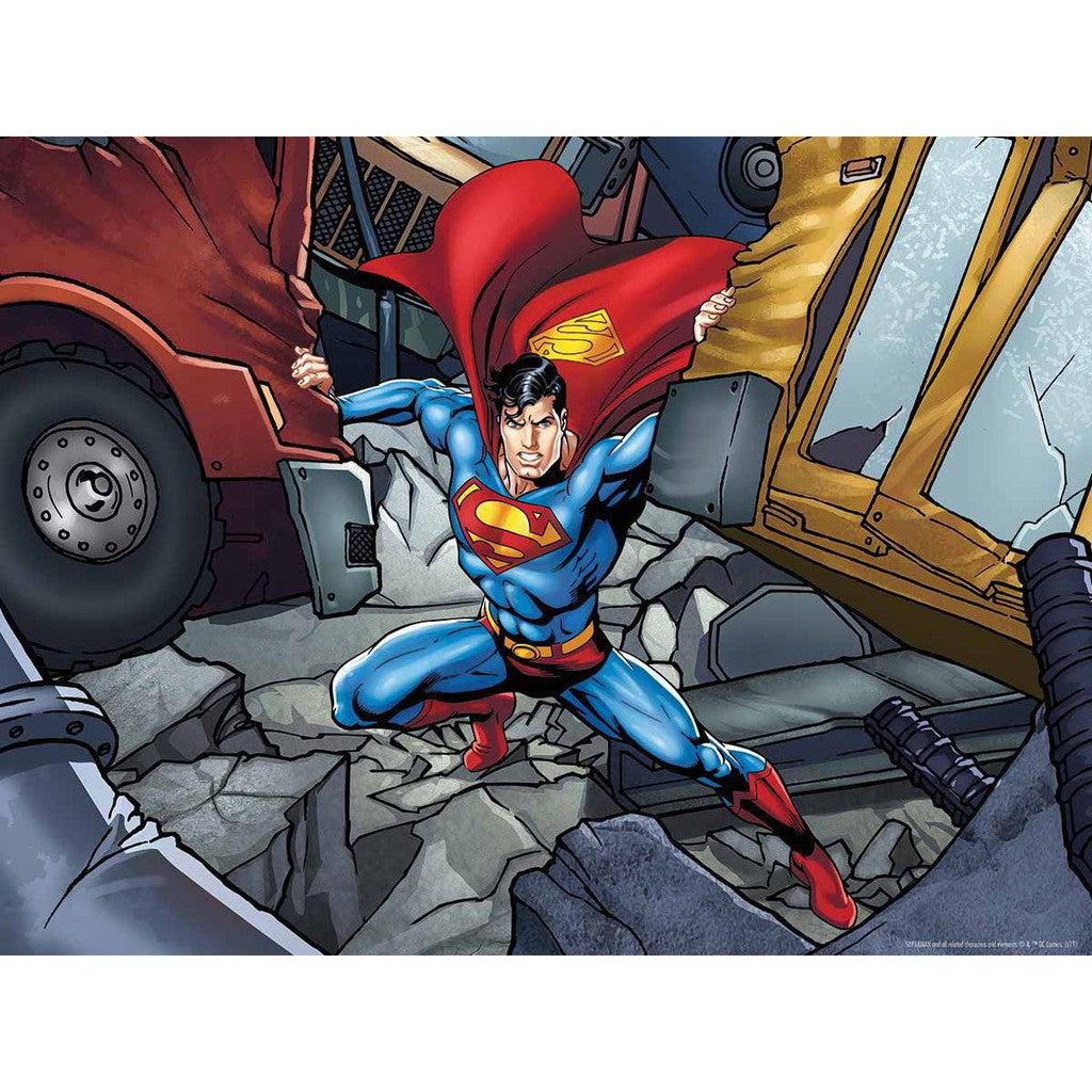 In his iconic blue and red costume, Superman showcases his unparalleled strength, effortlessly lifting large debris with a fierce expression in a damaged urban setting. 