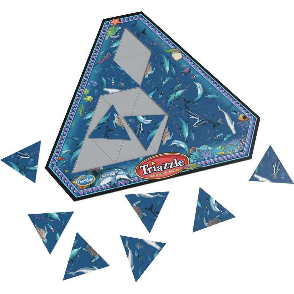 Triangular puzzle game with marine animal designs, labeled "Triazzle." Several triangular pieces are detached around the central board.