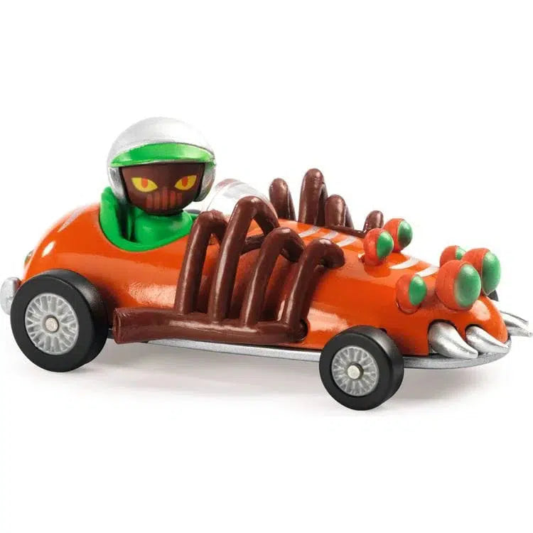 Introducing the "Turbo Spider" from Crazy Motors—a sleek boxed toy car with a green-helmeted driver in a red race car. Adorned with ultrasonic metallic paint and turbochargers, it races ahead against a checkered flag backdrop, capturing the thrill of speed and style.