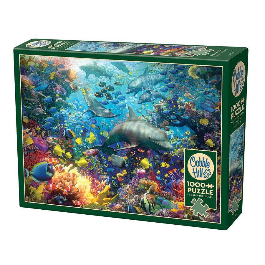 1000 pc puzzle of an underwater scene. vibrant fish of all types and colors swim around some dolphins and other sea creatures