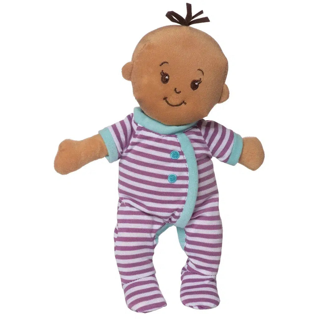 The Wee Baby Stella plush doll features a smiling face, short black hair, and dawns a purple and white striped onesie with teal trim. Perfect for endless cuddles, she's irresistibly soft and comes with her own magnetic bottle for added playtime fun.