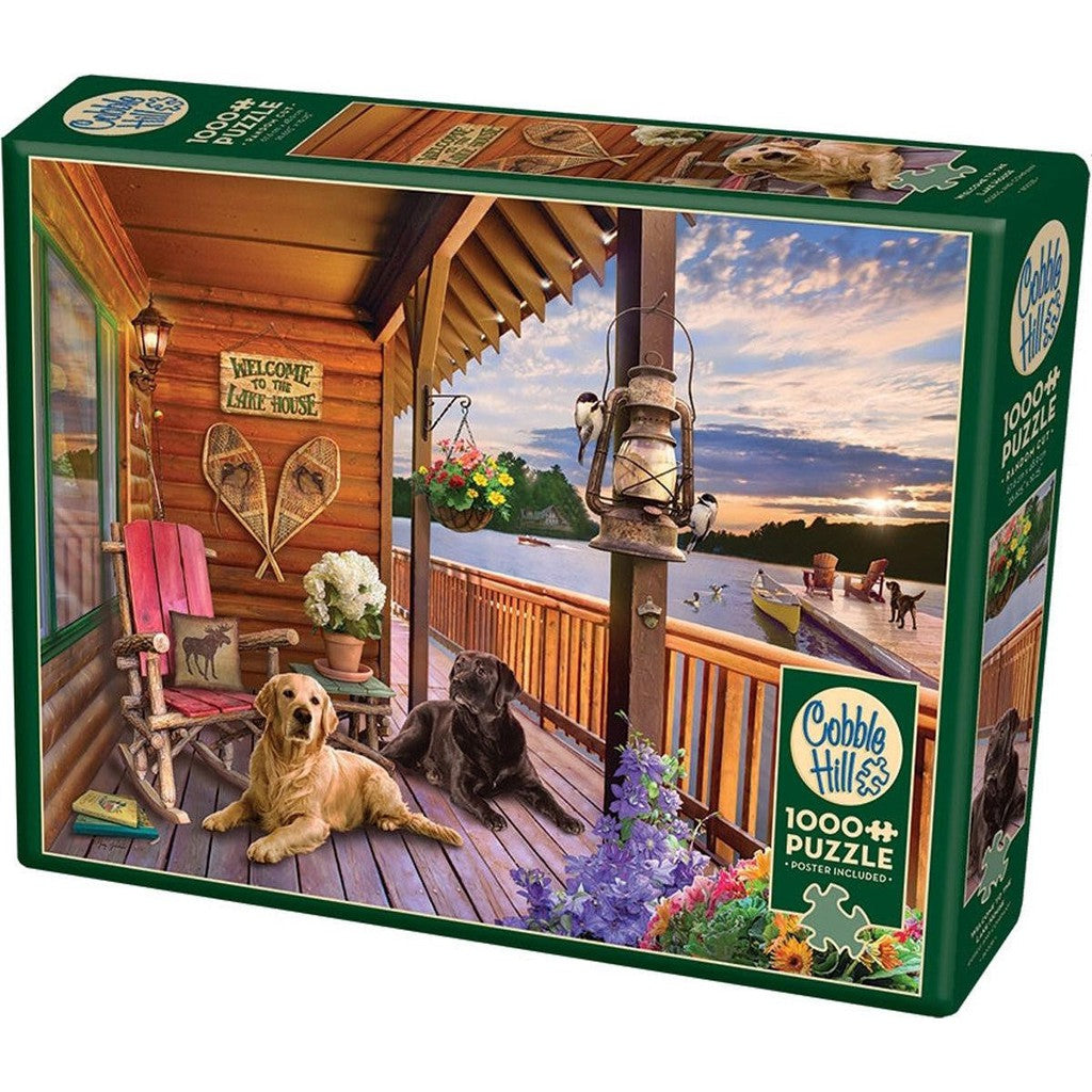 1000 pc puzzle of two dogs lounging on the porch of a cabin near a lake