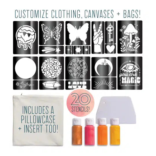 Stencil set with 20 reusable designs featuring animals, plants, and phrases. Includes a pillowcase, insert, scraper, and three fabric paint bottles. Text reads: "Customize clothing, canvases + bags with personalized fabric designs!