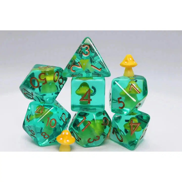 A set of green translucent polyhedral dice with yellow mushroom inclusions, perfect for Dungeons and Dragons or other role-playing games, displaying various numbers and arranged in a captivating cluster.