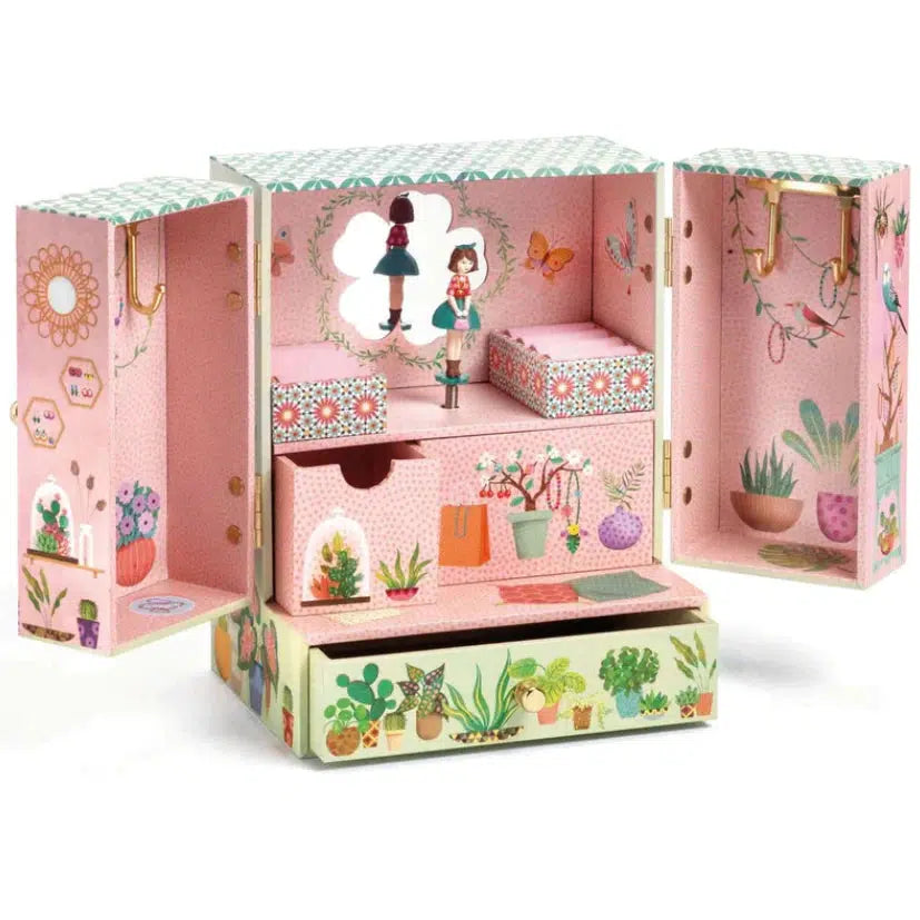 Image of the Secret Garden Treasure Box. It is pink on the inside and outside with tiny pictures of plants everywhere. On the inside are multiple boxes and drawers to hold things.